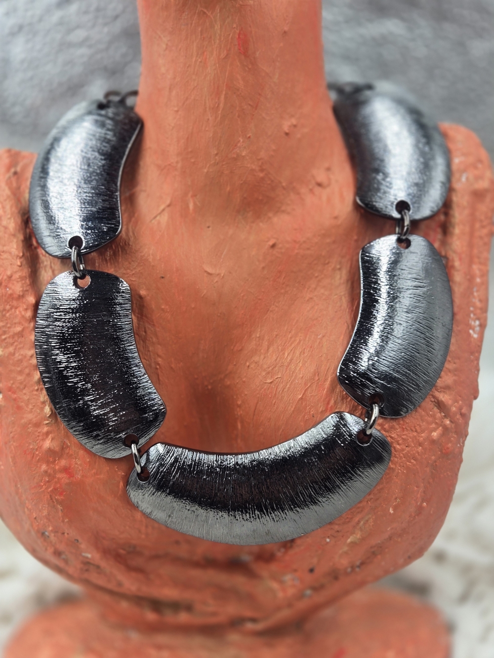 Heidi Klum silver tone textured necklace featuring brushed metal links.